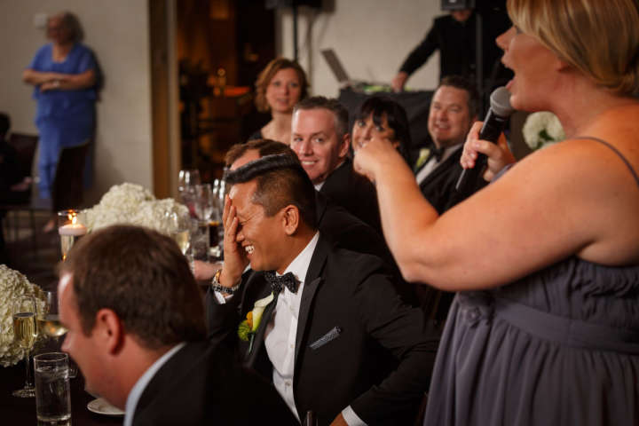 Illinois gay wedding photography of embarrassed groom
