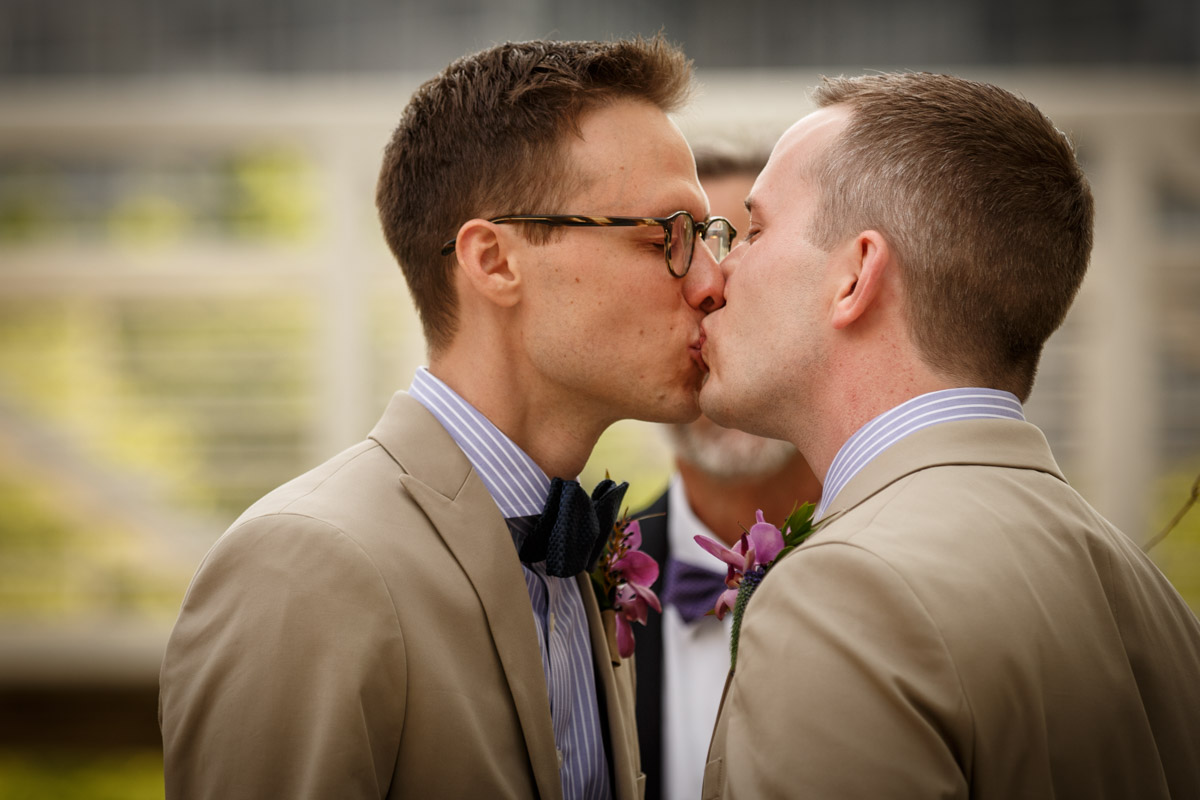 Illinois LGBT Wedding Photography first kiss at the Peggy Notebaert Nature Museum in Chicago