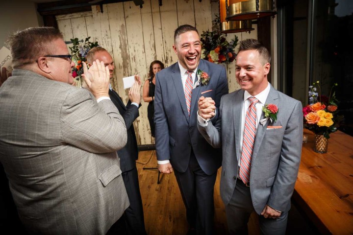 Evanston Gay Wedding Photography grooms exit wedding ceremony