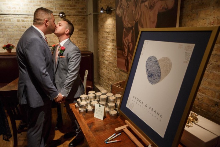 Gay grooms kiss after their wedding in Evanston Illinois