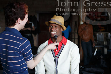 MUA Brandon Phillips and Sean Crack a smile while prepping for the second look.