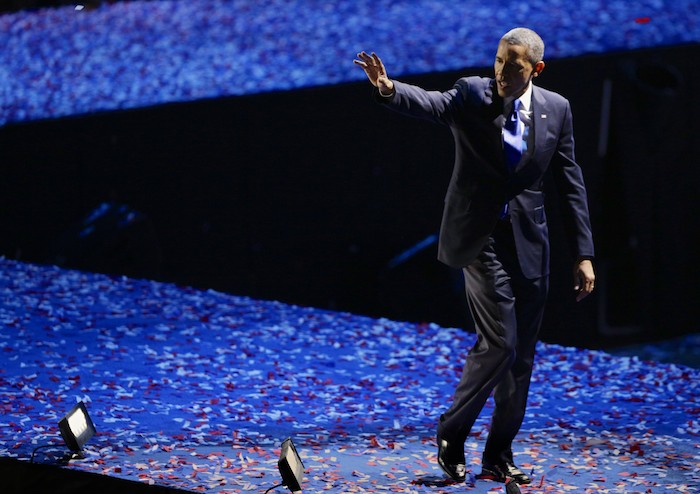 U.S. President Barack Obama leaves the stage after delivering his victory speech in Chicago, November 6, 2012. REUTERS/John Gress