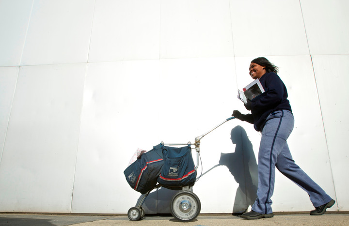 United States Postal Service Letter Carrier Lakesha Dortch-Hardy delivers mail in Chicago