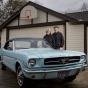 Tom (L) and Gail Wise pose with Gail's Skylight Blue 1964 1/2 Ford Mustang convertible outside their garage where it sat for 27 years before its restoration, in Park Ridge, Illinois November 26, 2013. Gail Wise, then using her maiden name of Gail Brown, made the first known retail purchase of a Mustang on April 15, 1964, two days before the model went on sale. Ford will unveil its next-generation 2015 Mustang on December 5, 2013 for the model's 50th anniversary with simultaneous events in Michigan, Shanghai, Sydney, Barcelona, New York and Los Angeles.