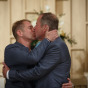 Grooms kiss at Chicago Suburban Gay Wedding