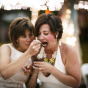 cutting the cake by Chicago Same-Sex Wedding Photographer lesbian