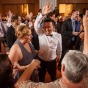 Gay groom dances at the James hotel in Chicago after his wedding