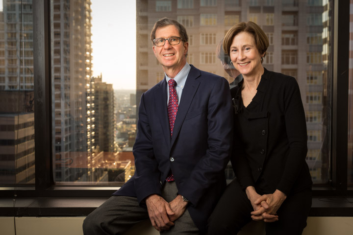 04/11/14 – Chicago, Illinois (60611) – Dr. Steve Newman M.D. and his wife Sara Neely Newman, M.D. pose for a photo in Mr. Newman's office. (John Gress for Tufts University)