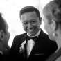 Illinois gay wedding photography of smiling groom in Chicago