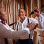 Evanston Gay Wedding photographer african american groom dances