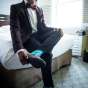 Black Gay Groom Gets readdy for wedding at Hilton Orrinton Hotel in Evanston Illinois