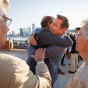 Grooms hug after their gay wedding in Chicago