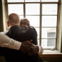 Chicago Gay Wedding Photographer captures grooms hugging before their wedding