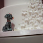 Elysia Root cakes Chicago lgbt wedding photographer captures new years eve reception at the Park Hyatt dog poodle on cake