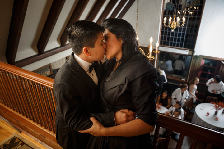 Chicago Suburbs Lesbian Wedding Photographer couple kiss after wedding ceremony in Glenview