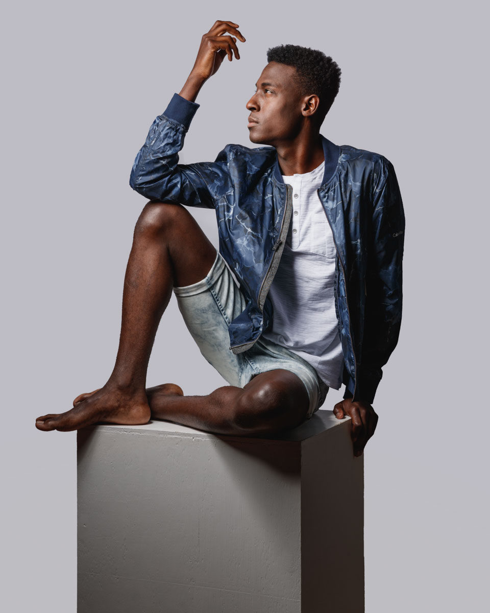a model portfolio creative posing for men