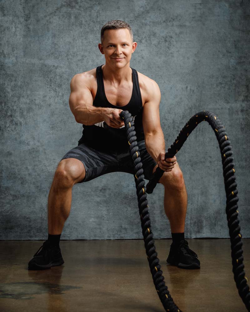 Chicago Fitness Photographer captures personal trainer using a battle rope
