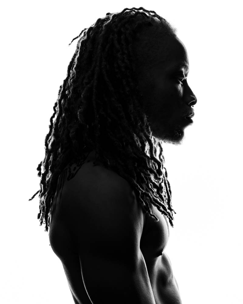 male model silhouette against white backdrop 