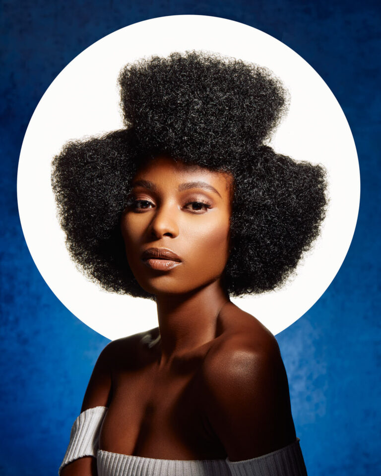 a stunning headshot of a black female model by famed Chicago fashion photographer John Gress