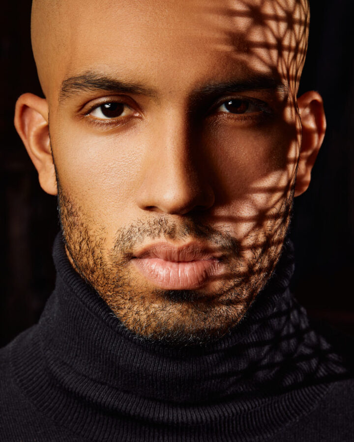 A stunning headshot of a black male model near Chicago Illinois