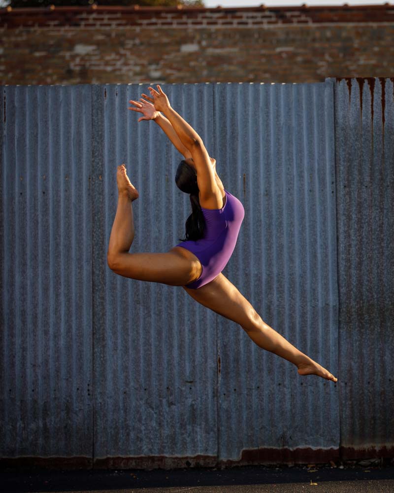 Dancer Headshots Chicago industrial background midair pose