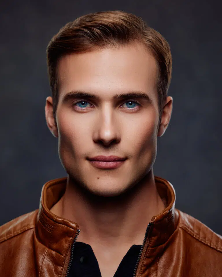 male model model poses for Chicago headshot photographer symmetrical blue eyes blond hair