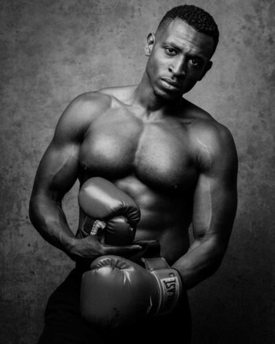 Black-and-white shot capturing Teagan's athletic prowess, ideal for fitness and athletic marketing