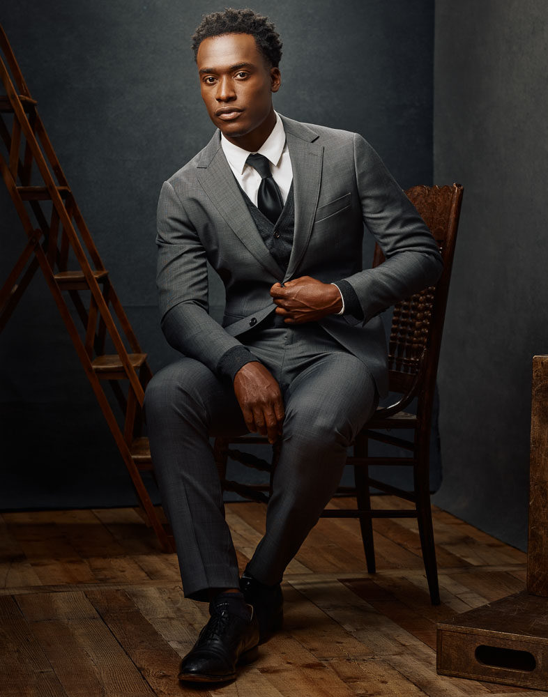 Model digital portfolio in Chicago - Full-body portrait of Justin in a gray three-piece suit