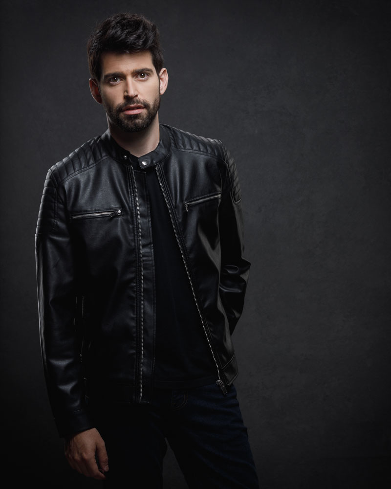 Jake in a leather jacket with beard