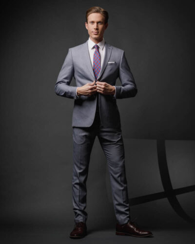 Full body portrait of Lucas in a tailored suit by a Top model photographers in Chicago