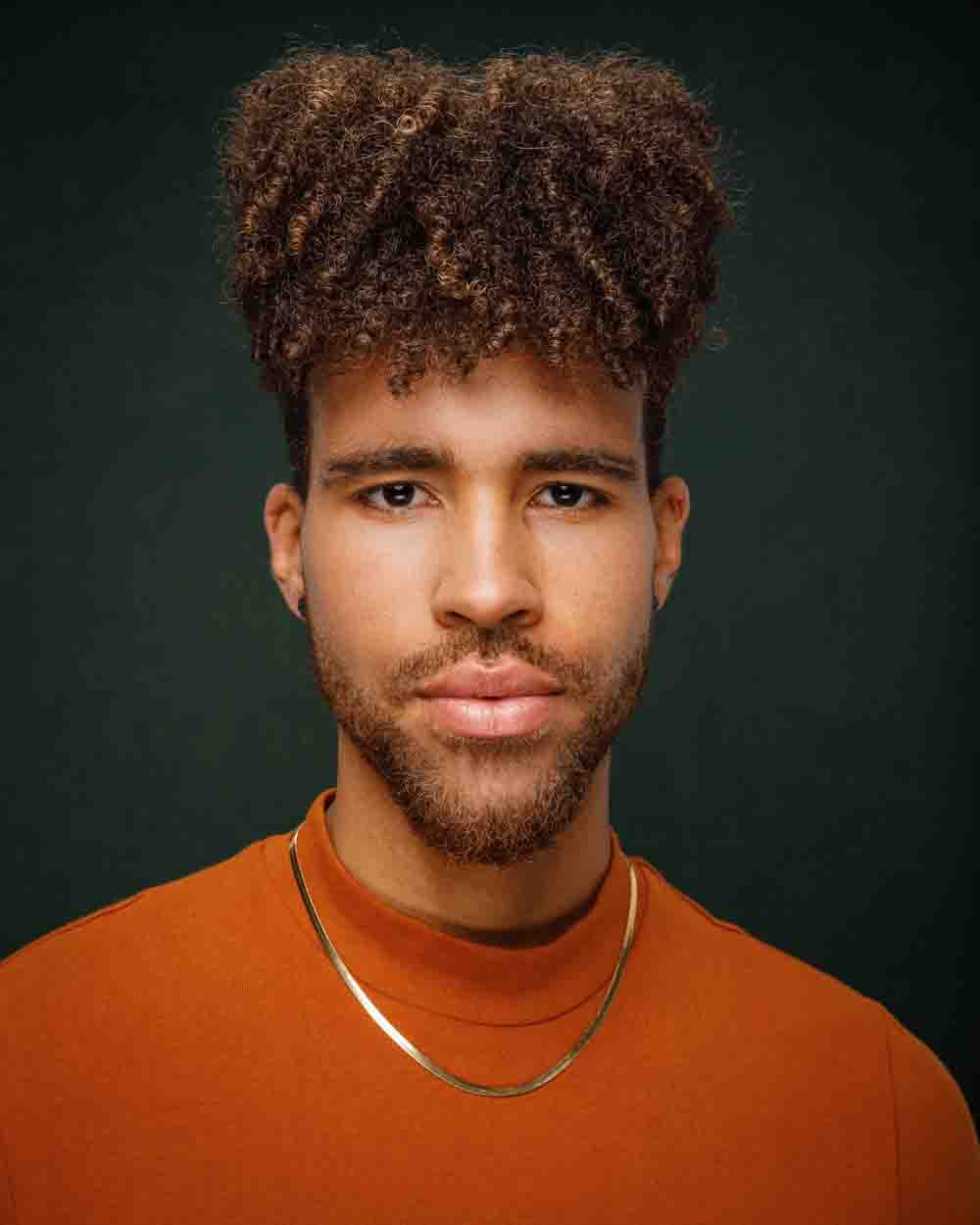 Fitness model headshots Chicago - Trae's intense focus during a studio session