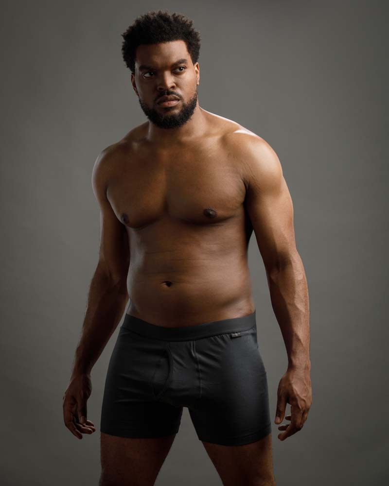 Big and tall male model Mark W. in an underwear shoot, showcasing his comfort and confidence, ideal for fashion modeling