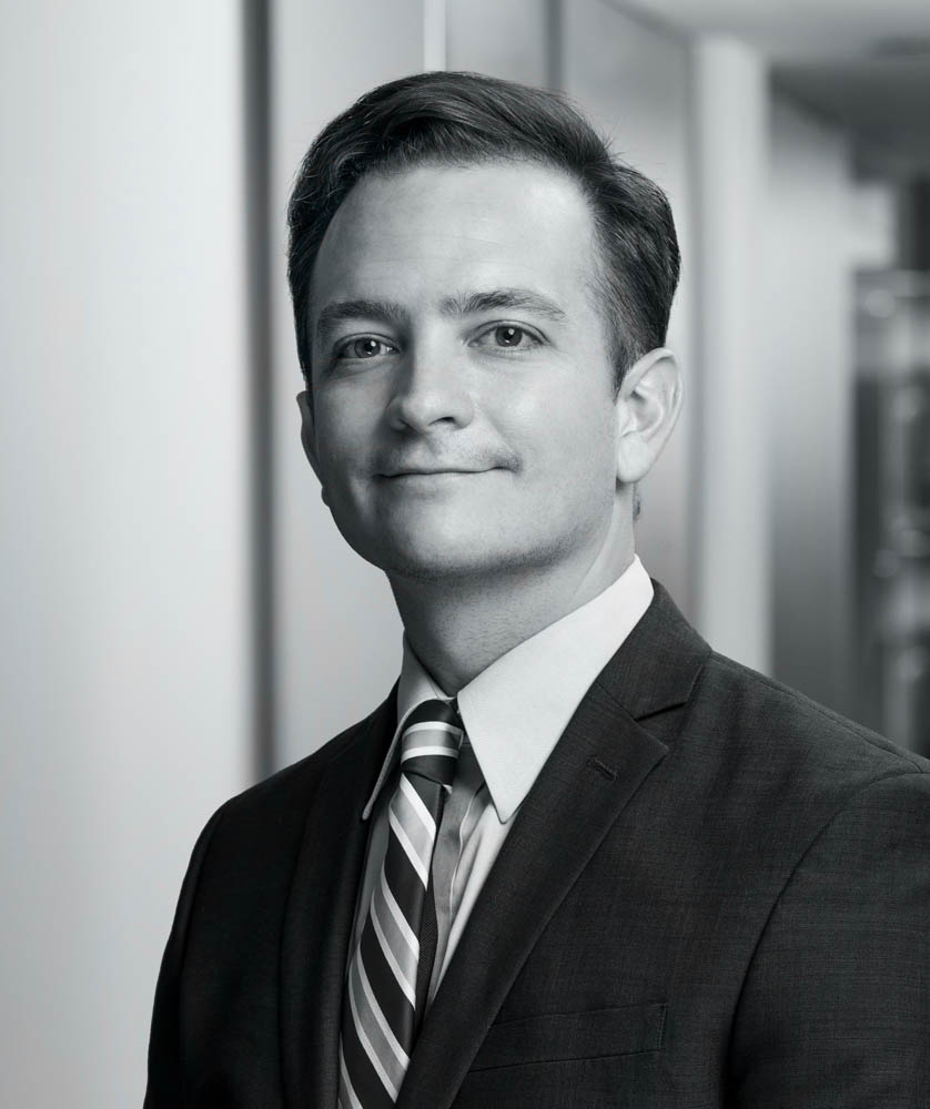 Professional headshot of a male attorney at a Chicago law firm