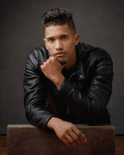 Intense waist-up portrait of Enrique, showcasing the impact of headshot photography in Chicago