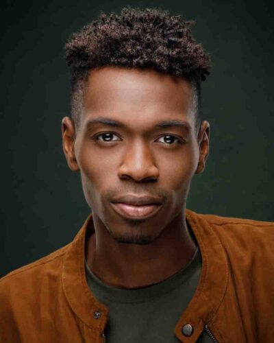 headshots in Chicago - Lawaun's dramatic close-up in green T-shirt