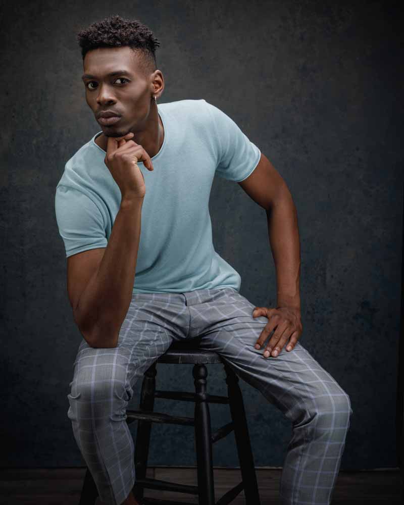headshots in Chicago - Lawaun showcasing a professional look in plaid suit pants