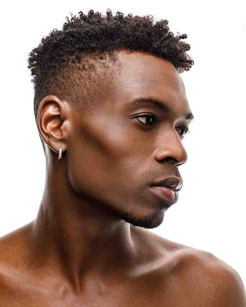 profile headshot of male model Lawaun on a white pure backdrop