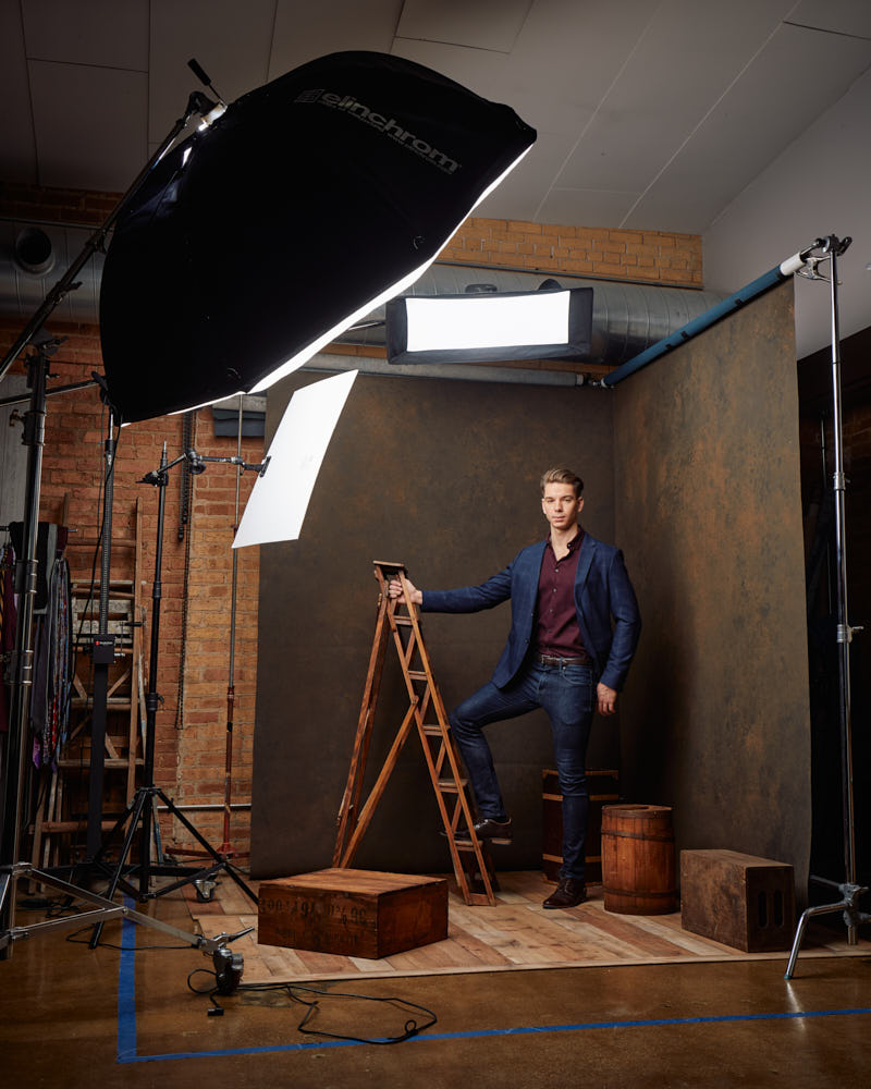Erik in a sophisticated suit, exemplifying a polished and professional look for his portfolio