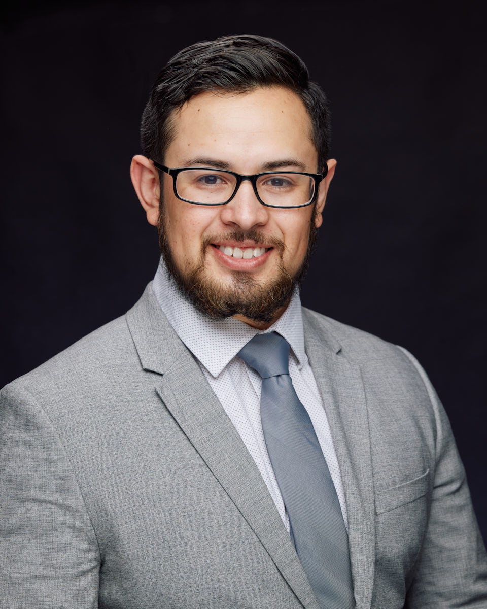 Baudello exuding confidence and professionalism in his Chicago realtor headshots.