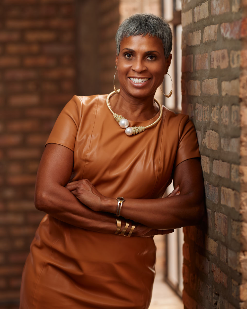 Shari from the reviews, radiating professionalism and warmth in her Chicago realtor headshots.