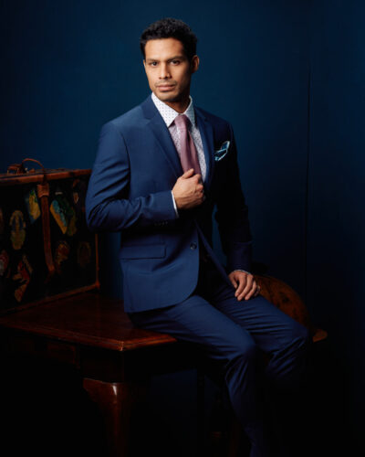Model photoshoot pricing Chicago - three-quarter length portrait on desk