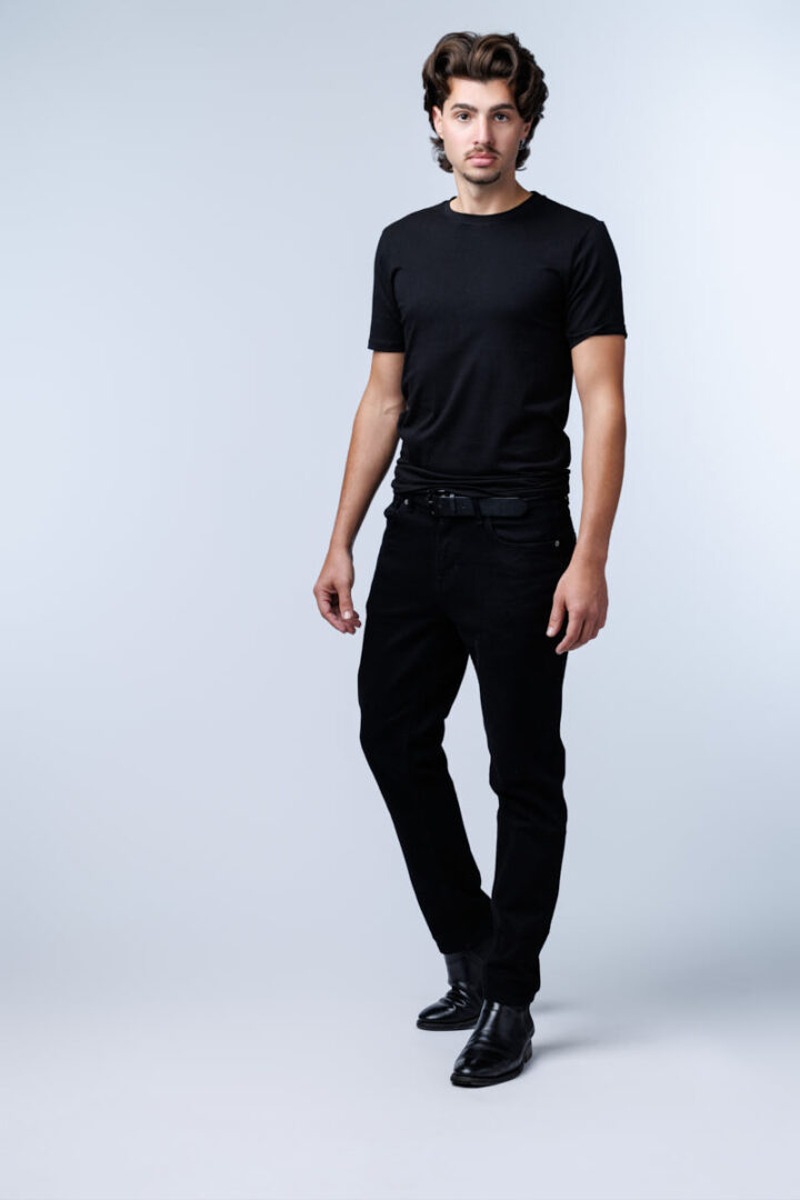 model digitals in Chicago-Model Marko posing for a professional digital portfolio session in Chicago. Full-body portrait against a clean studio background, showcasing posture and physique for modeling digitals.