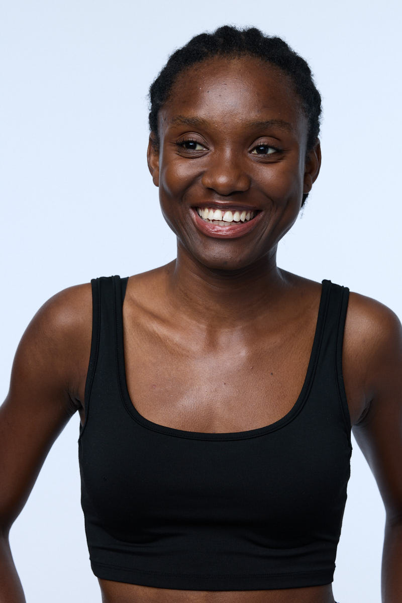 Close-up portrait of Samenta smiling.