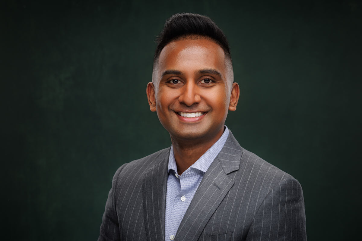 Executive business headshot in Chicago of professional man in gray suit