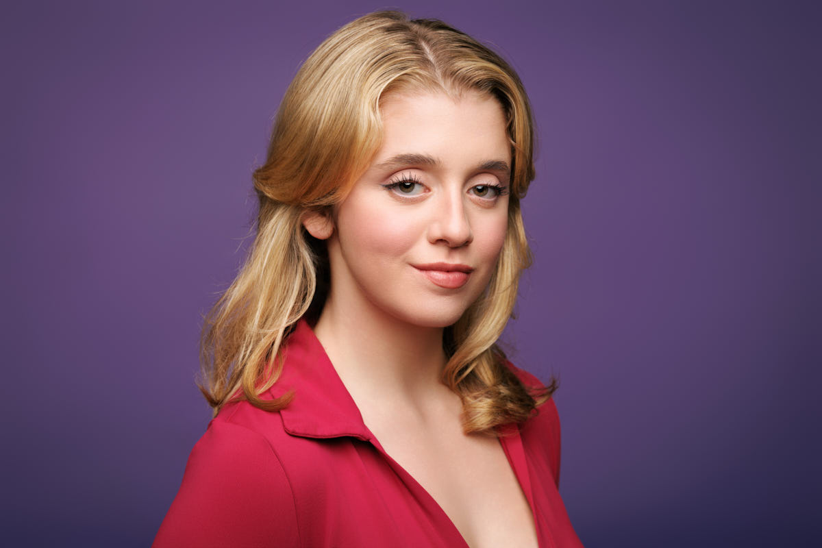 Bold studio commercial actor headshot Chicago purple background