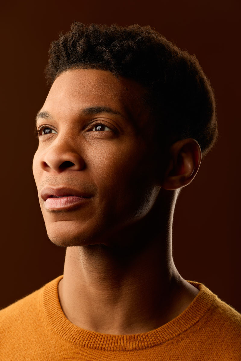 Headshots for dancers in Chicago-Male dancer portrait Chicago warm tones studio headshot