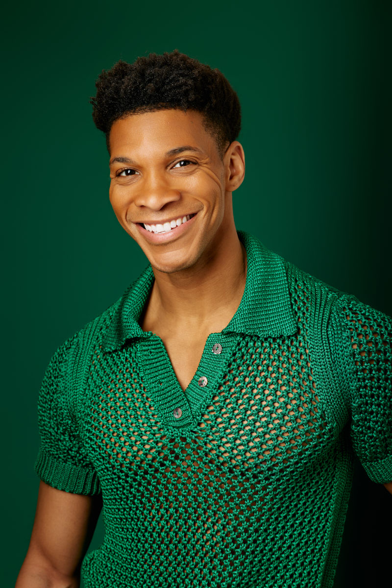 Headshots for dancers in Chicago-Chicago dancer headshot green background smiling portrait