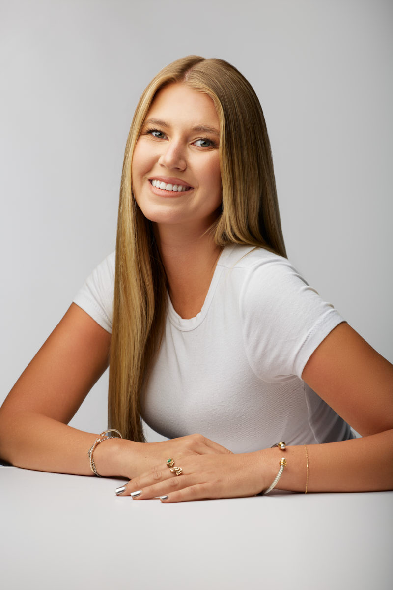 Mackinzie’s warm smile and approachable expression create an engaging commercial headshot suitable for lifestyle advertising and branding.