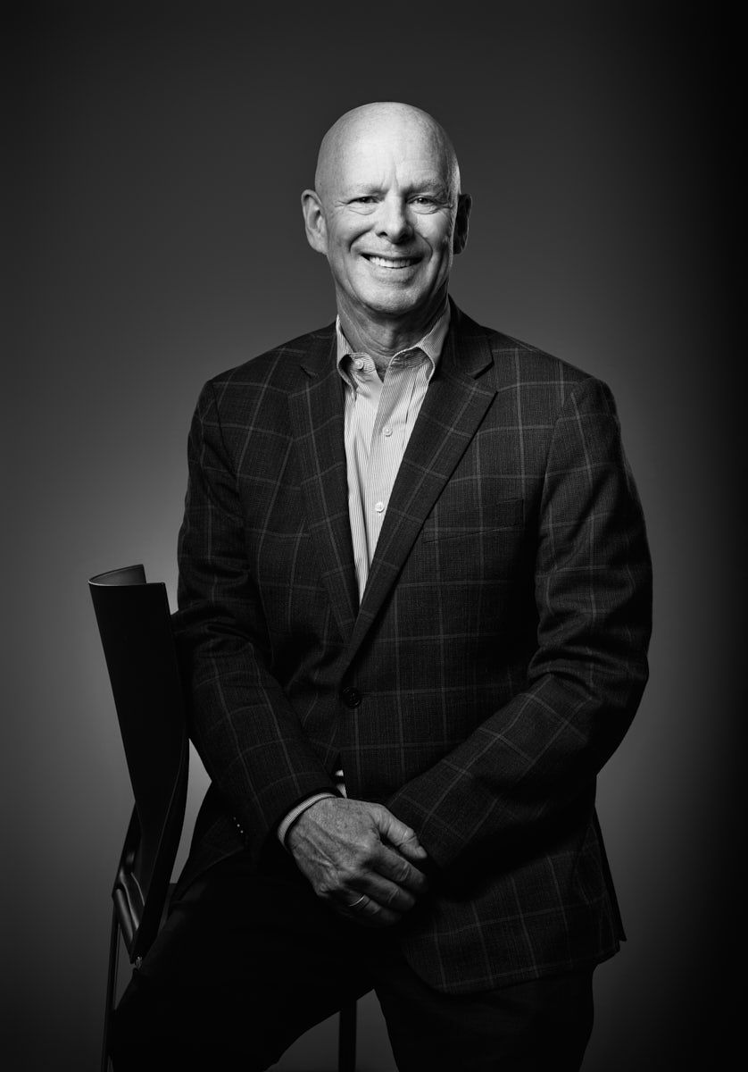 Subtle expression and posture used in executive portrait for branding