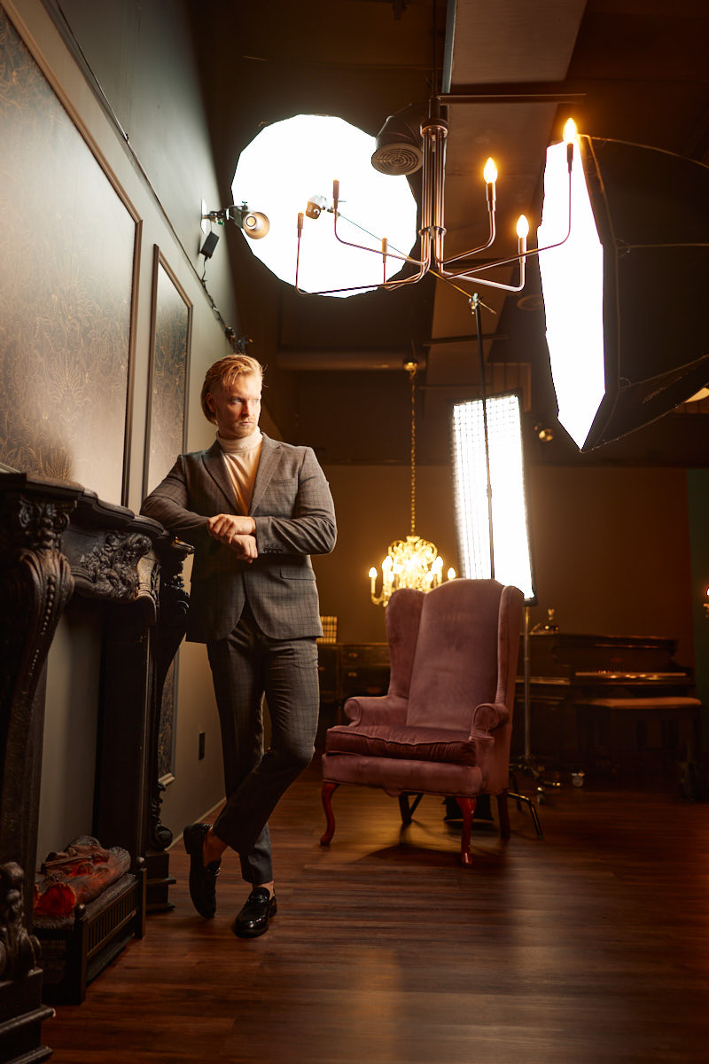 Behind the scenes with an editorial headshot photographer in Chicago using flash modifiers around Nick
